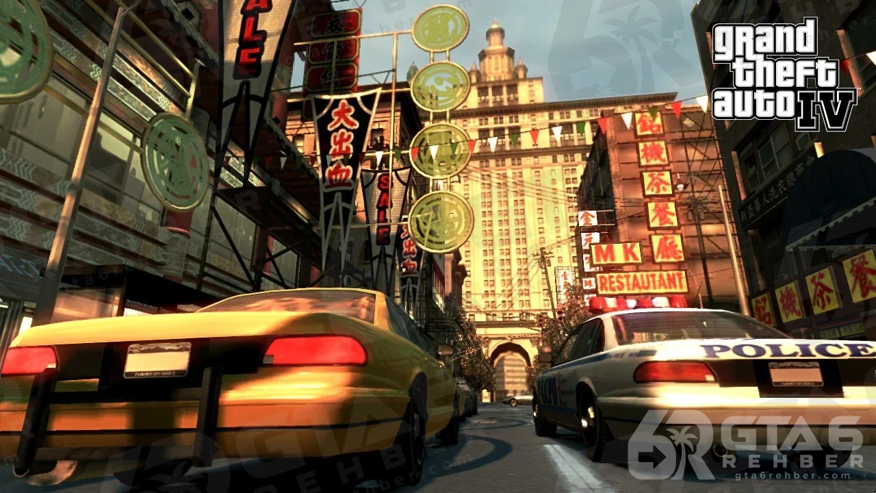 Liberty City Chinatown’da sarı taksi, polis arabası ve Çince tabelalı binalar