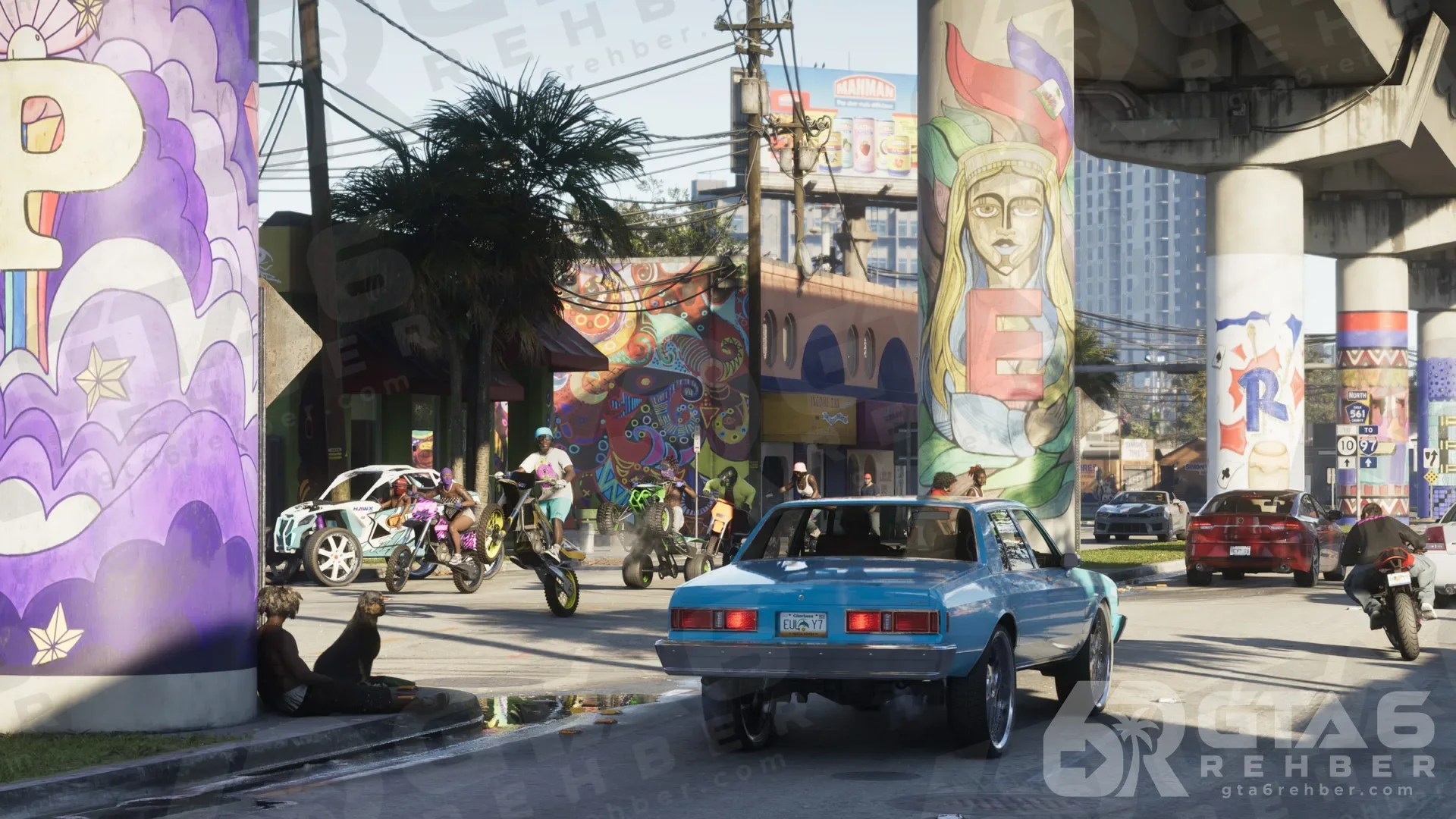 Vice City'de duvar resimli üst geçit ayaklarının altında mavi klasik araba ve motosikletliler